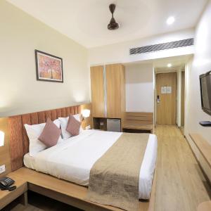Classic Triple Room (Welcome Drink,Room Upgrade,Early Check-In/Late Check Out upto 2 hours (subject to availability),15% Off on Laundry service) 