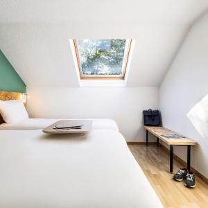 family room with one double and one single bed