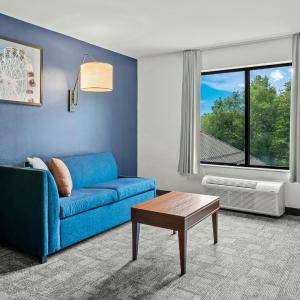 Extended Queen Suite with Two Queen Beds and Sofa Bed