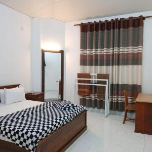 Three-Bedroom Apartment with Balcony