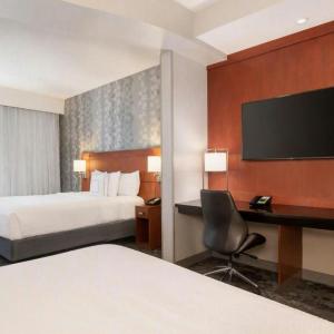 Studio with One King Bed, One Queen Bed and Sofa Bed