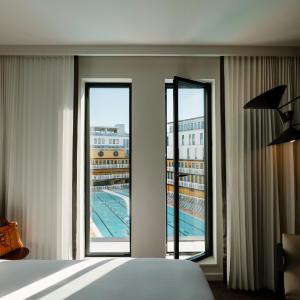 Superior Family Room with Two Queen Beds and Connecting Rooms - Pool View