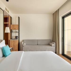 Sol Room Partial Sea View (2 Adults + 2 Children)