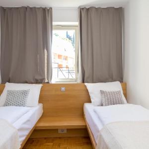 Two-Bedroom Apartment with Balcony and Garden View