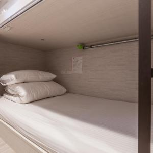 Bed in Male Dormitory Room
