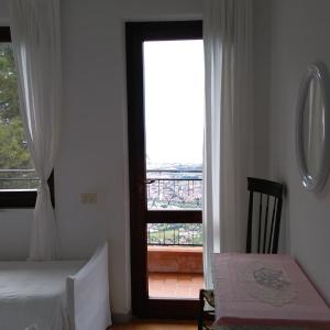 Two Connecting Double Rooms with Balcony and Sea View