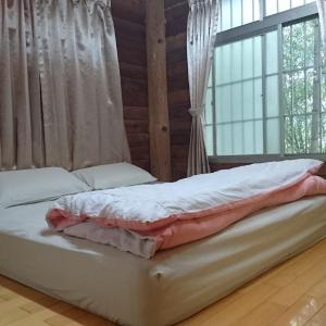 Queen Room with Shared Bathroom