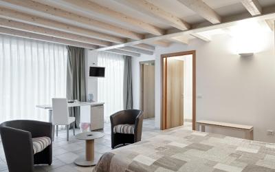 Camera Quadrupla Superior