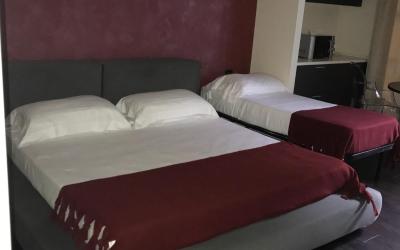 Camera Tripla con Vista Giardino