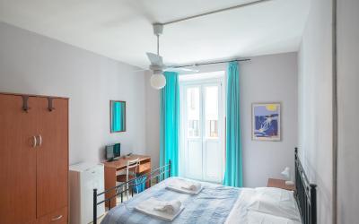 Camera Quadrupla con Bagno in Comune 