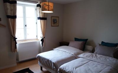 Chambre Lits Jumeaux - Vue sur Jardin Chambre Lits Jumeaux - Vue sur Jardin