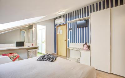 Camera Deluxe Matrimoniale/Doppia con Letti Singoli