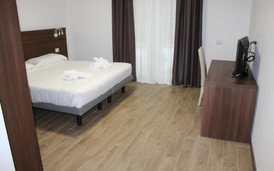 Due Camere Matrimoniali Comunicanti con Vista Giardino