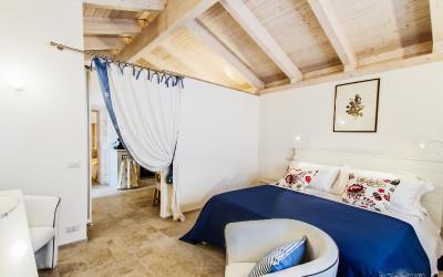 Camera Quadrupla Superior