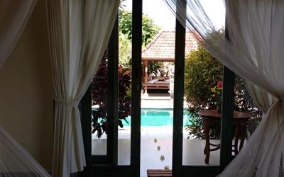 Kamar Deluxe dengan Pemandangan Kolam Renang Kamar Deluxe dengan Pemandangan Kolam Renang