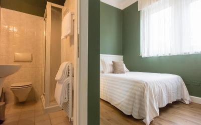 Camera Quadrupla Superior