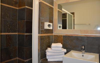 Camera Quadrupla Superior