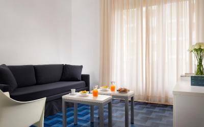 Camera Tripla con Vista Giardino