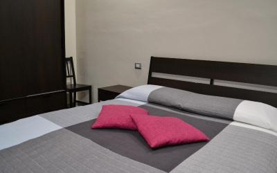 Camera Familiare con Vista Giardino