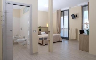 Camera Quadrupla Superior