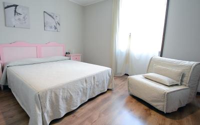 Camera Tripla con Vista Lago