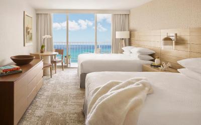 Two Queen Beds and Premier Ocean Front View