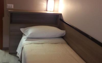 Camera Singola con Servizi Igienici in Comune