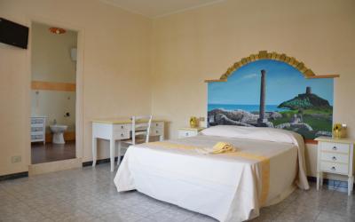 Camera Quadrupla con Vista Giardino 