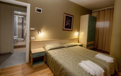 Camera Familiare con Bagno in Comune