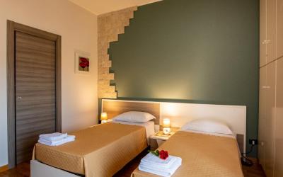 Camera Matrimoniale/Doppia con Letti Singoli