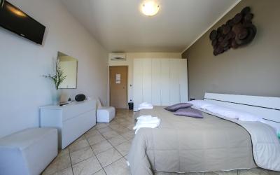 Camera Matrimoniale Deluxe con 1 Letto Supplementare