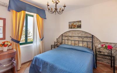 Camera Quadrupla Superior