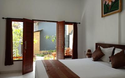 Kamar Standard Double dengan Pemandangan Taman Kamar Standard Double dengan Pemandangan Taman