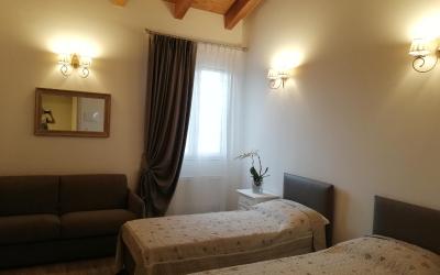 Camera Deluxe Doppia con Letti Singoli