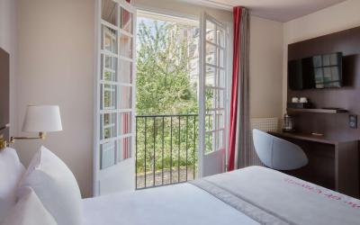 Chambre Lit King-Size Confort - Non-Fumeurs Chambre Lit King-Size Confort - Non-Fumeurs