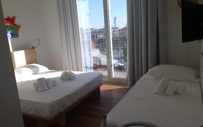 Camera Tripla con Vista Giardino