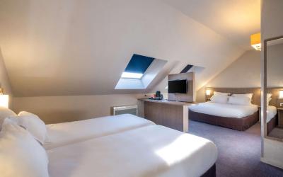 Chambre Lit Queen-Size avec Lit Simple - Non-Fumeurs Chambre Lit Queen-Size avec Lit Simple - Non-Fumeurs