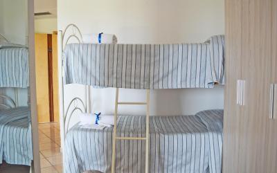 Camera Quadrupla Superior