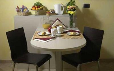 Camera Quadrupla Superior