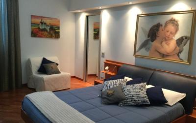 Camera Quadrupla Superior