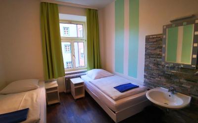 Zweibettzimmer mit Gemeinschaftsbad