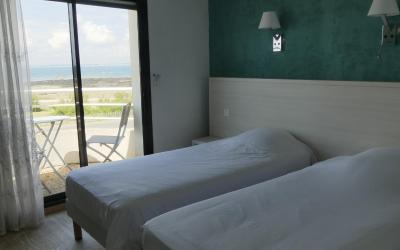 Chambre Lits Jumeaux avec Terrasse - Vue sur Mer  Chambre Lits Jumeaux avec Terrasse - Vue sur Mer