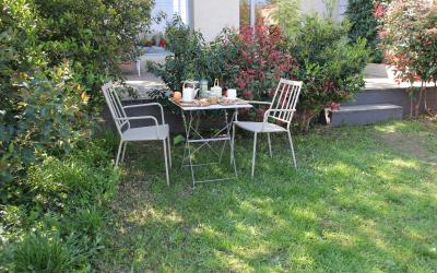 Chambre Lit Queen-Size - Vue sur Jardin