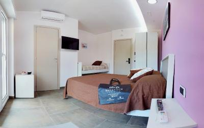 Camera Tripla con Balcone