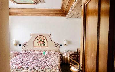 Camera Quadrupla Superior