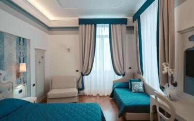 Camera Tripla con Vista Lago