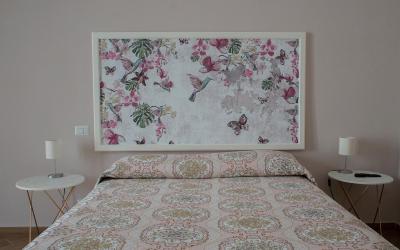 Camera Quadrupla Superior