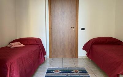 Camera Doppia con Letti Singoli con Bagno Privato Esterno 