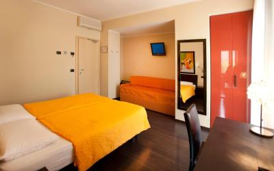 Camera Familiare con Vista Giardino