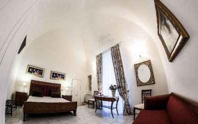 Camera Quadrupla Superior